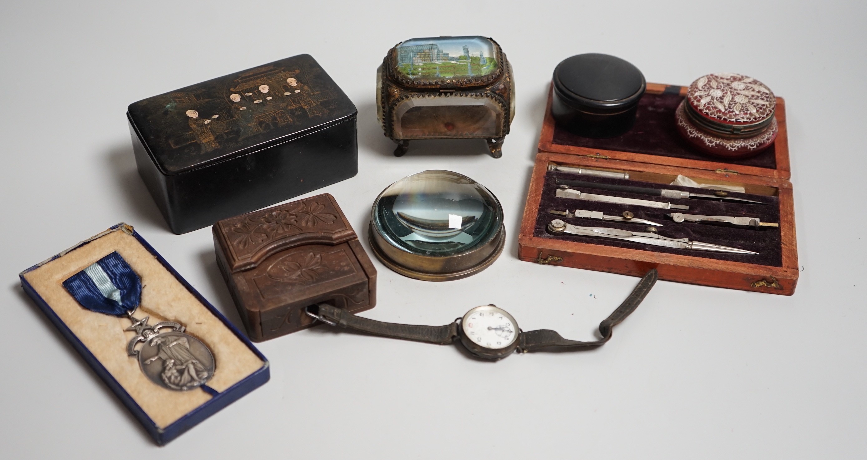 Mixed collectables: Stanley compass paperweight, a cranberry pot, a Great Exhibition souvenir casket, etc